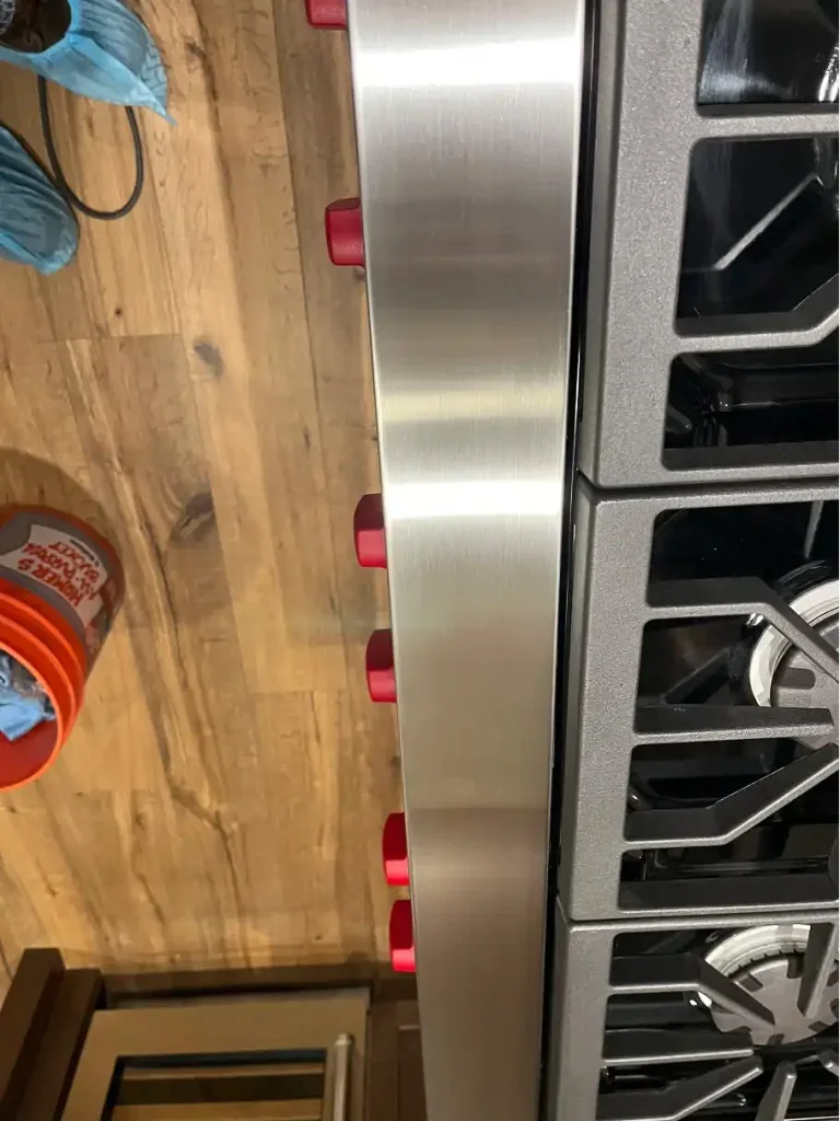 The same stainless cooktop after repair