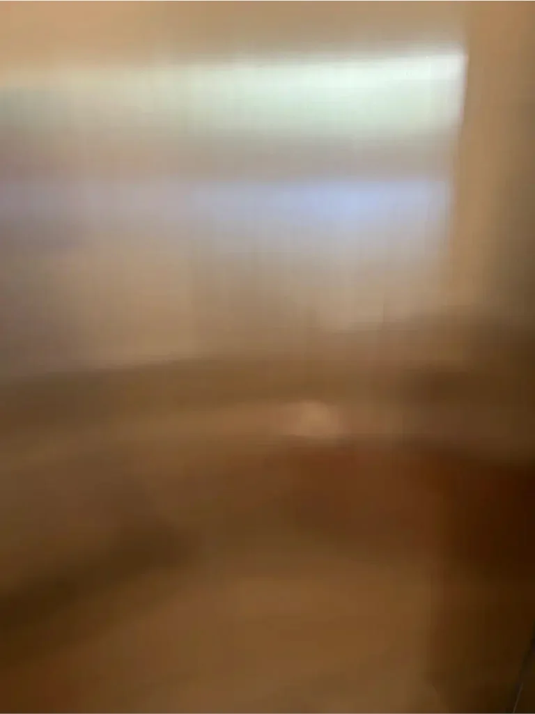 The same stainless elevator door after repair
